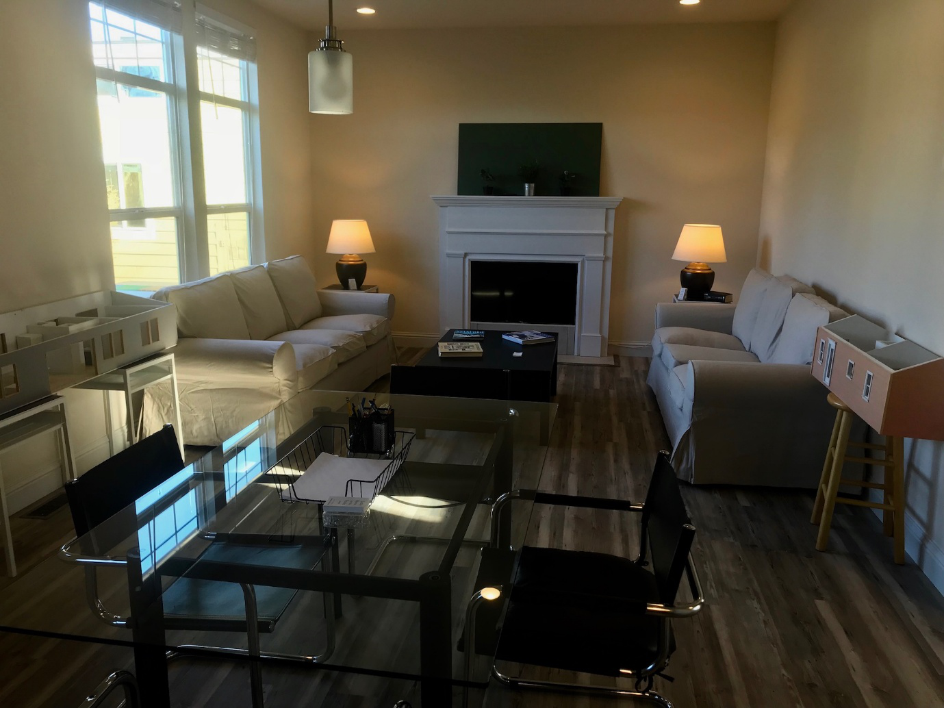 Modern prefab ADU interior with living room, fireplace, and open layout